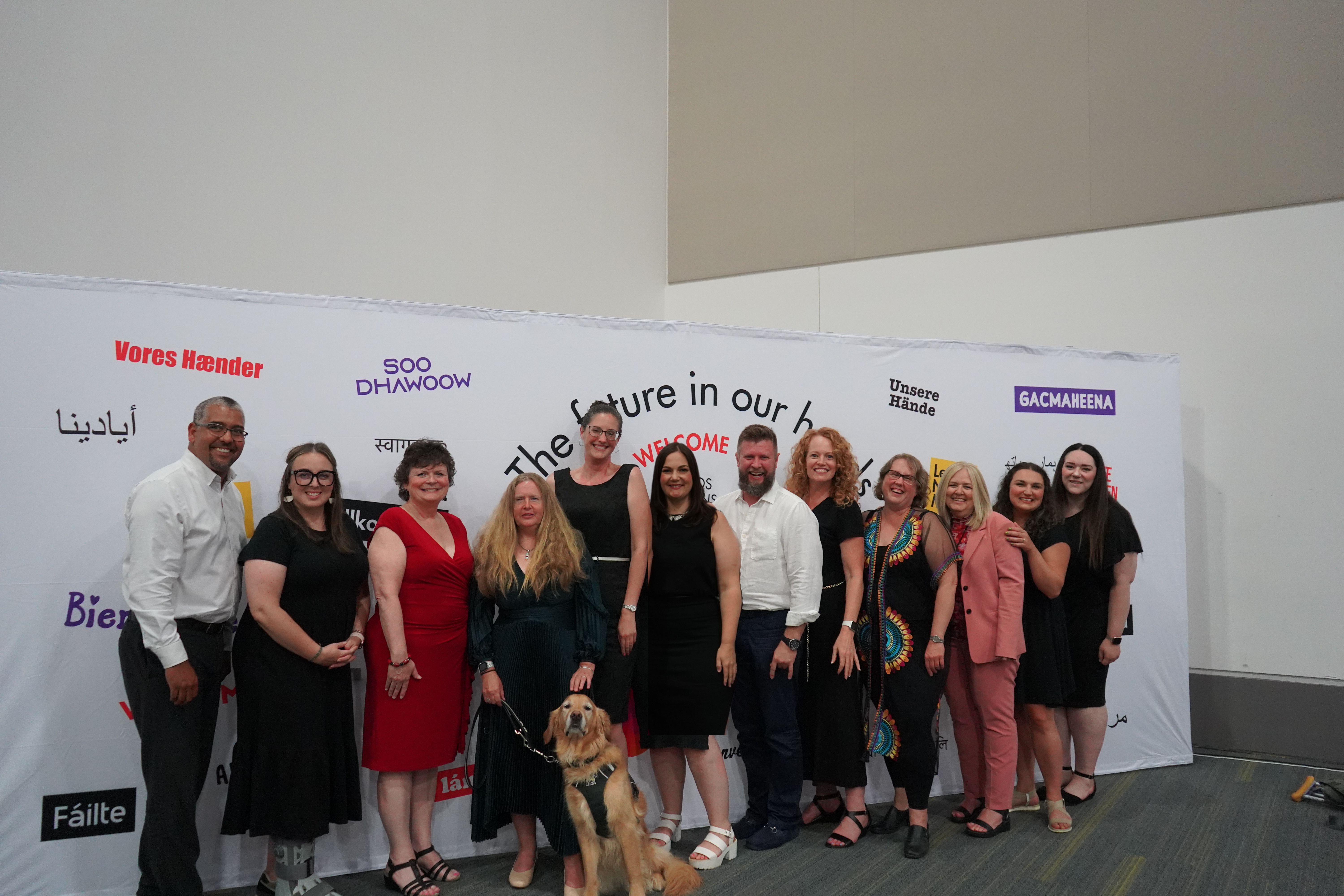 The DBCS team poses for a photo at the gala for the Deafblind International Conference. 